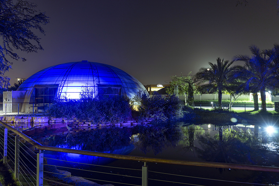 Image for The Sustainable City Lights Up Its Green Biodomes Blue To Mark Autism Awareness Month